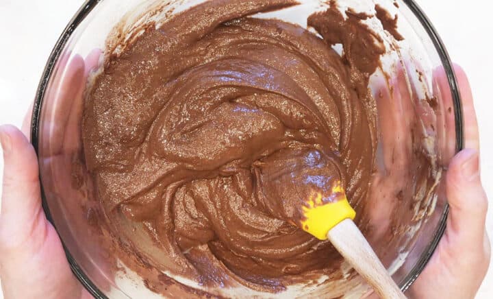 Keto chocolate cookies batter in a bowl.