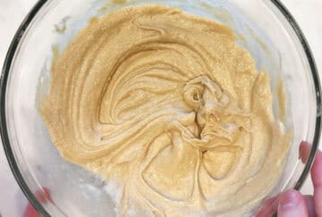 Sesame batter mixed with water in a bowl.