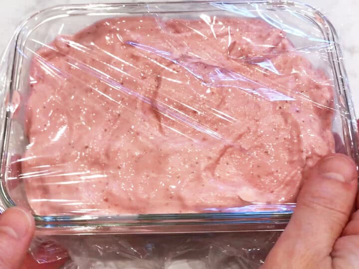 Preparing keto ice cream for the freezer.