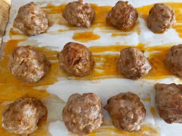 The meatballs are ready in the pan.