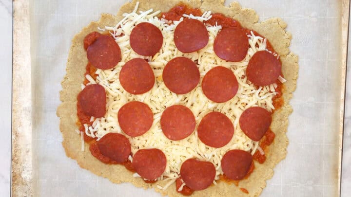 Toppings were added to the crust.