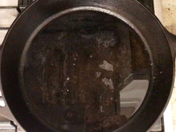 Bacon grease in a cast-iron skillet.