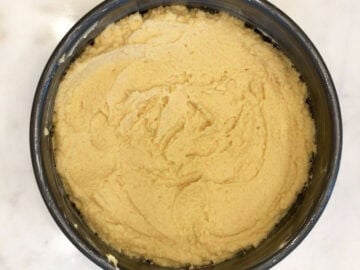 The batter is in the pan, ready to be beaked.