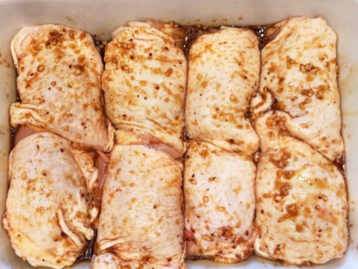 The chicken is coated in the marinade.