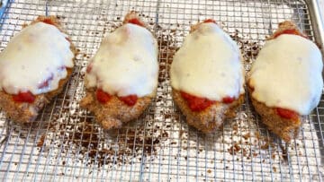 The chicken is ready in the pan.