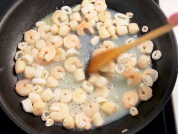 Cooking the seafood.