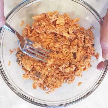 Flaking the salmon.