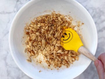 Seasoning the seeds.