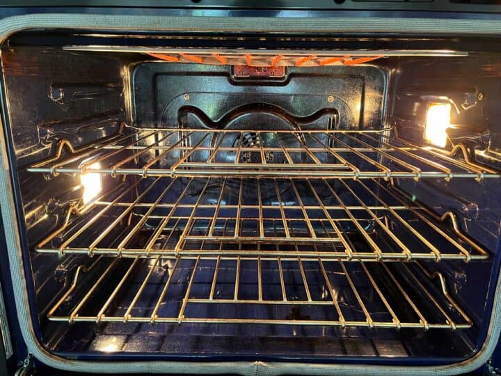 An oven rack is set 6 inches below the broiler element.