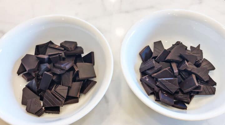 Two bowls with chocolate chunks.
