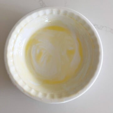 A greased pie plate.