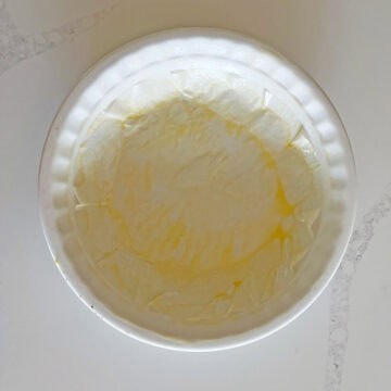 A parchment-lined pie plate.