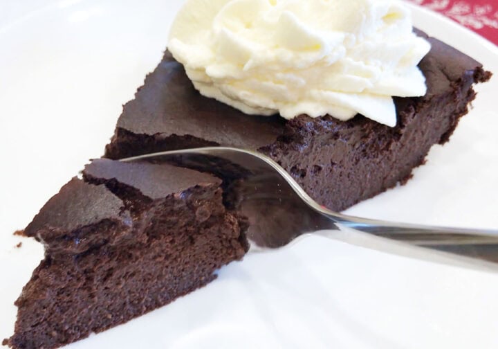 Cutting into a slice of pie.