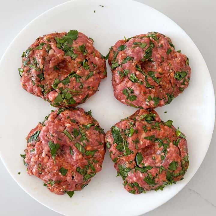 Shaping the burgers.