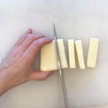 Slicing the halloumi block.