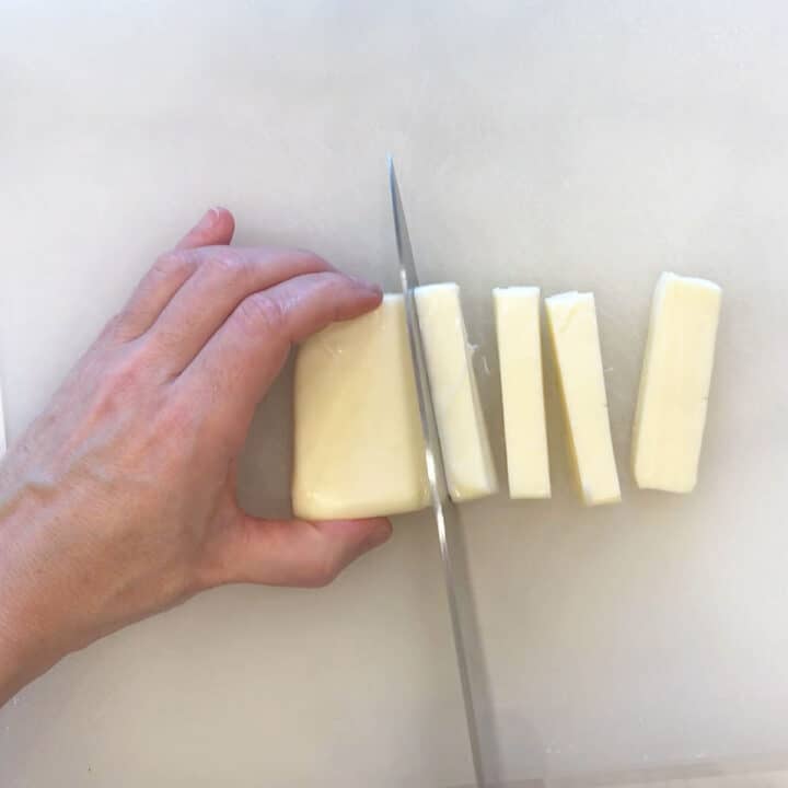 Slicing the halloumi block.