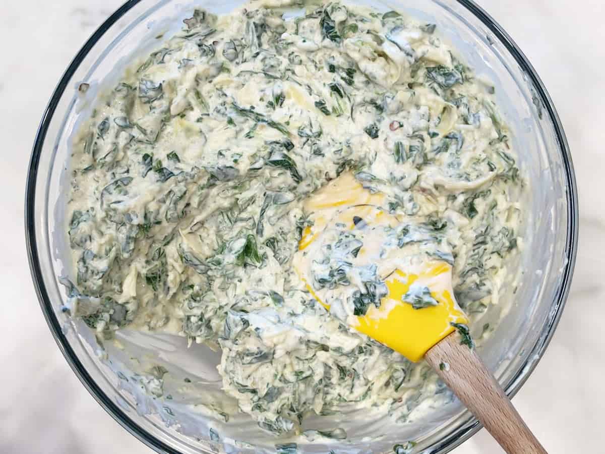 Spinach and artichoke were added to the bowl.