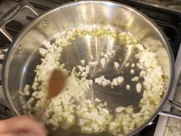 Sauteing the onions in a skillet.