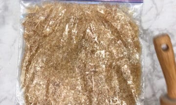 Crushed pork rinds in a resealable bag.