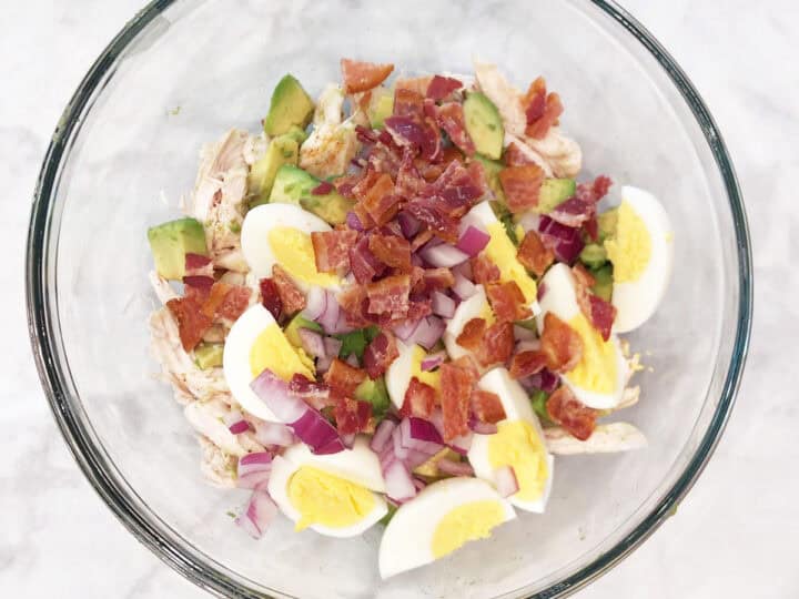 The salad ingredients were added in a bowl.