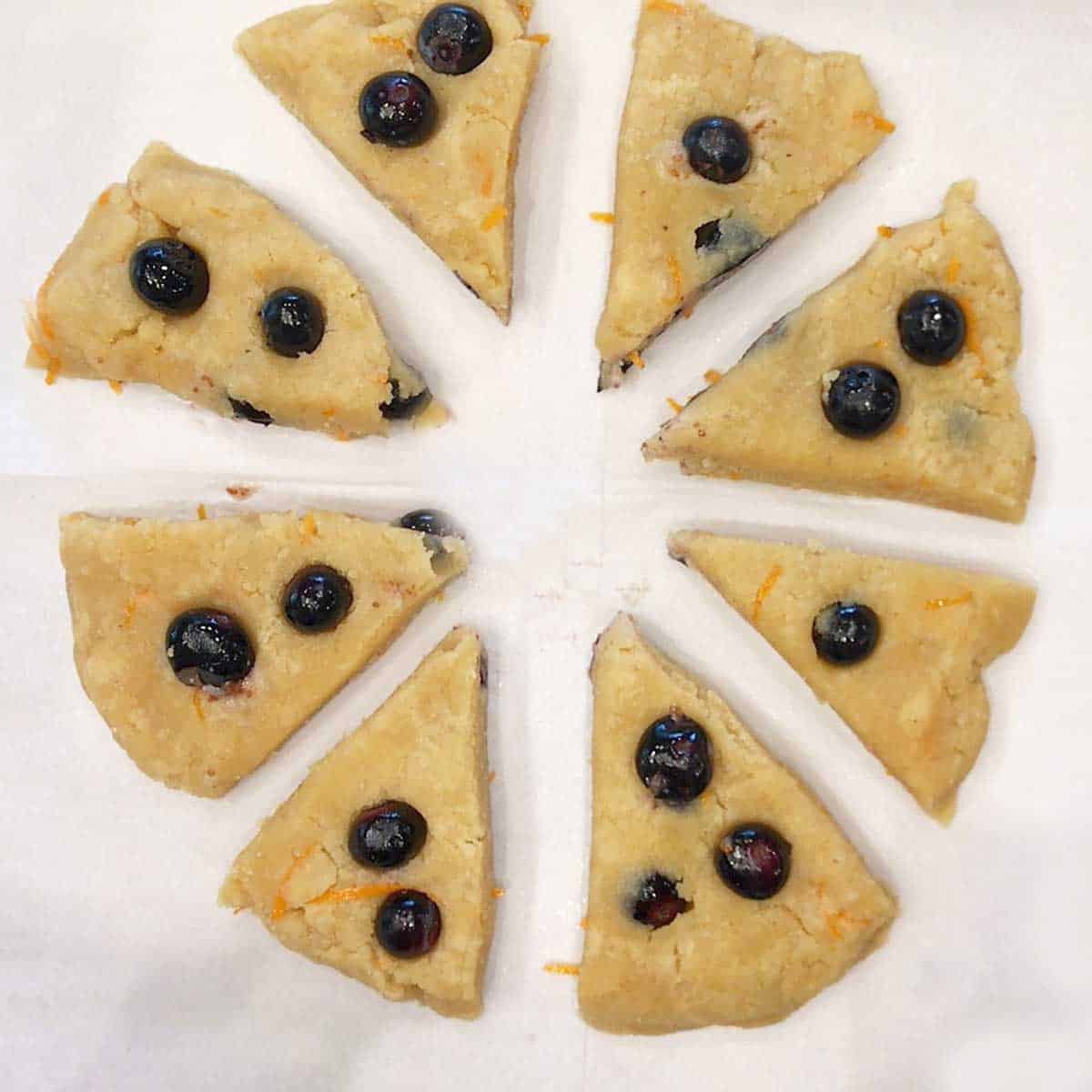 Separating the dough triangles on the pan.