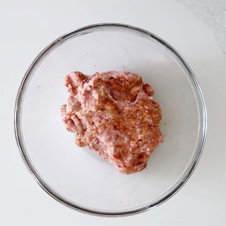 The ground pork was mixed with spices.