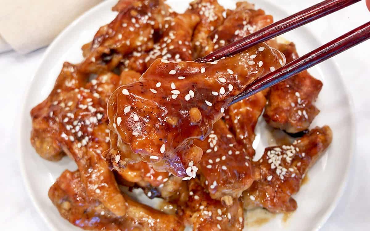 The wings are eaten with chopsticks.