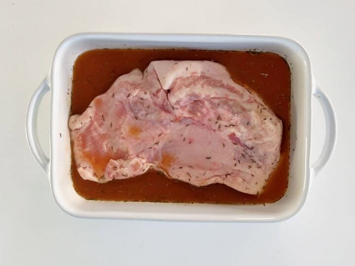 The braising liquid was added to the pan.