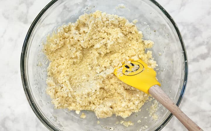 Cauliflower and egg mixture in a bowl.