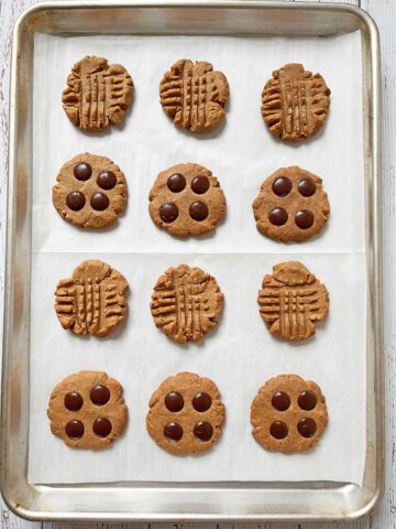 The cookies are fully baked in the pan.