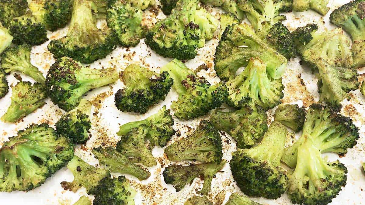 Roasted frozen broccoli is ready in the pan.