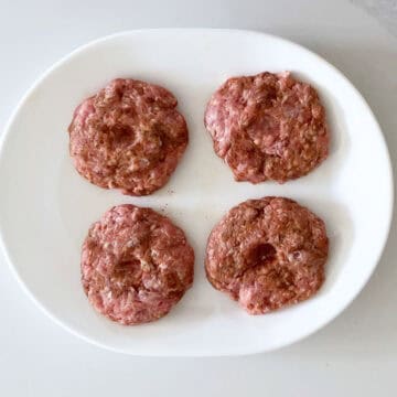 The shaped burgers are ready for the skillet.