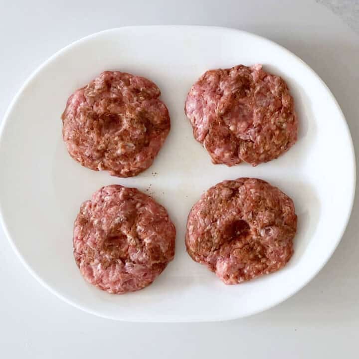 The shaped burgers are ready for the skillet.