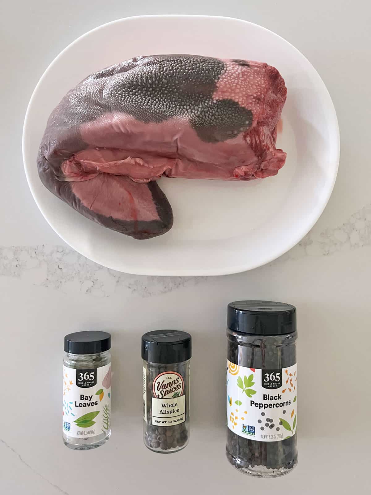 The ingredients needed to cook beef tongue.