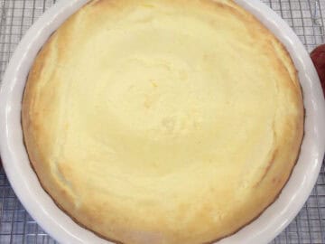 The cake is fully baked and ready in the pan.