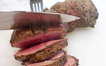 Cutting the roast.