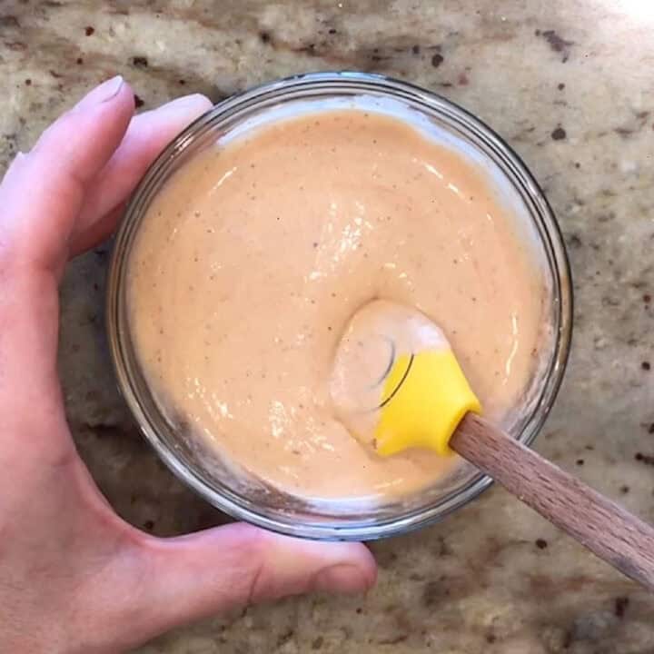 Mixing the dipping sauce in a small bowl.
