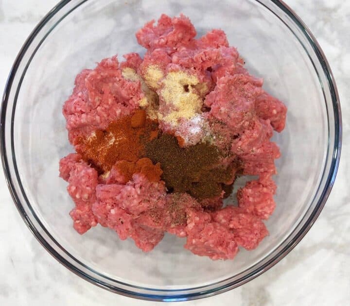 Burger ingredients in a bowl.