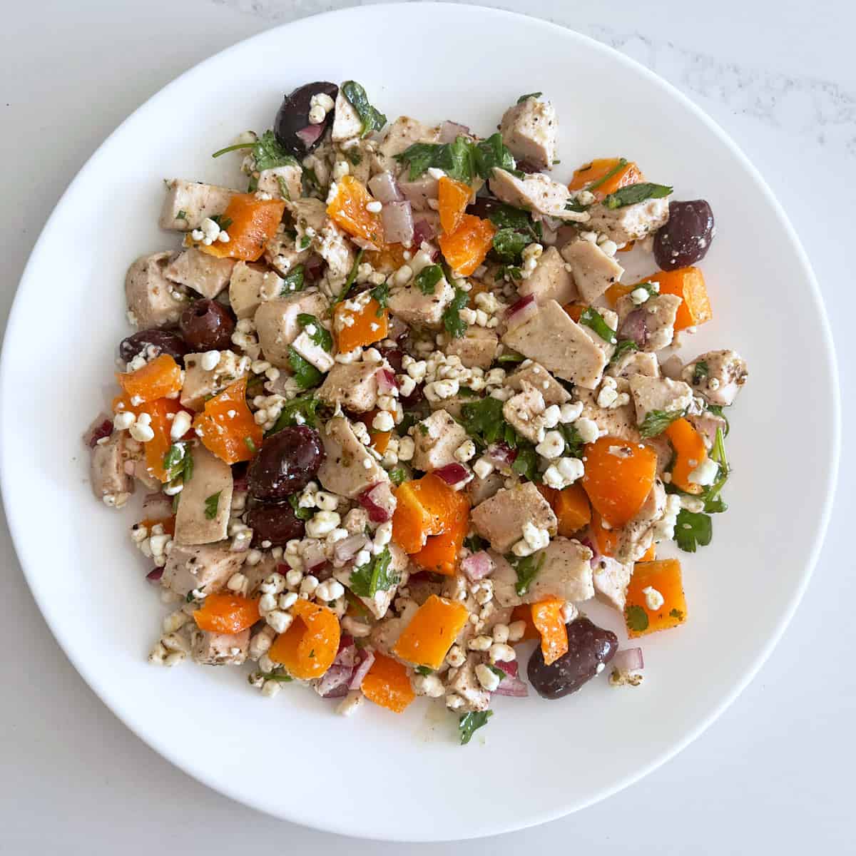 No mayo chicken salad with orange bell peppers.