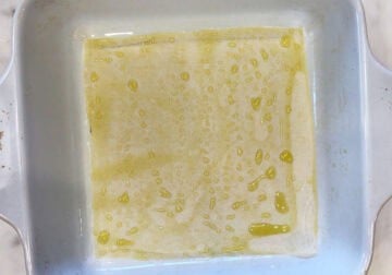 A square pan lined with parchment and greased.