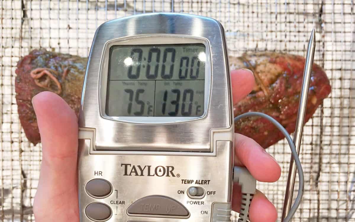 Setting the thermometer to 130°F.