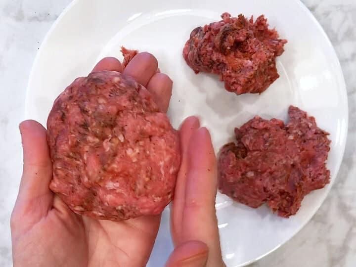 Shaping the burgers.