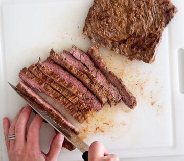 Slicing the steak.