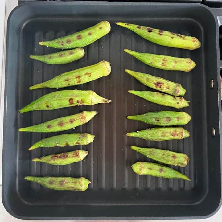 The okra was turned to the other side in the grill pan.