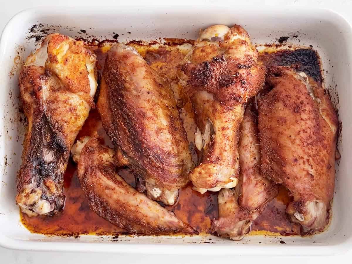 The wings are fully baked in the pan.