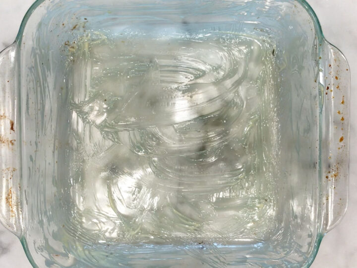 A buttered 8-inch baking dish.