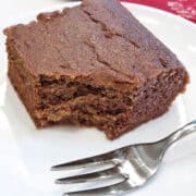 A keto gingerbread slice is served with a fork.