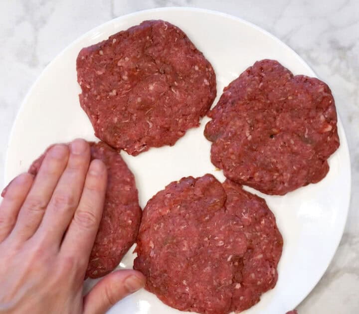 Shaping the burgers.