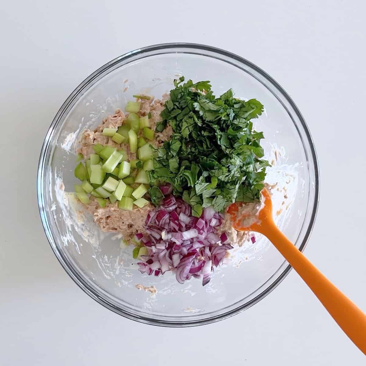 Celery, red onion, and cilantro were added to the salad.