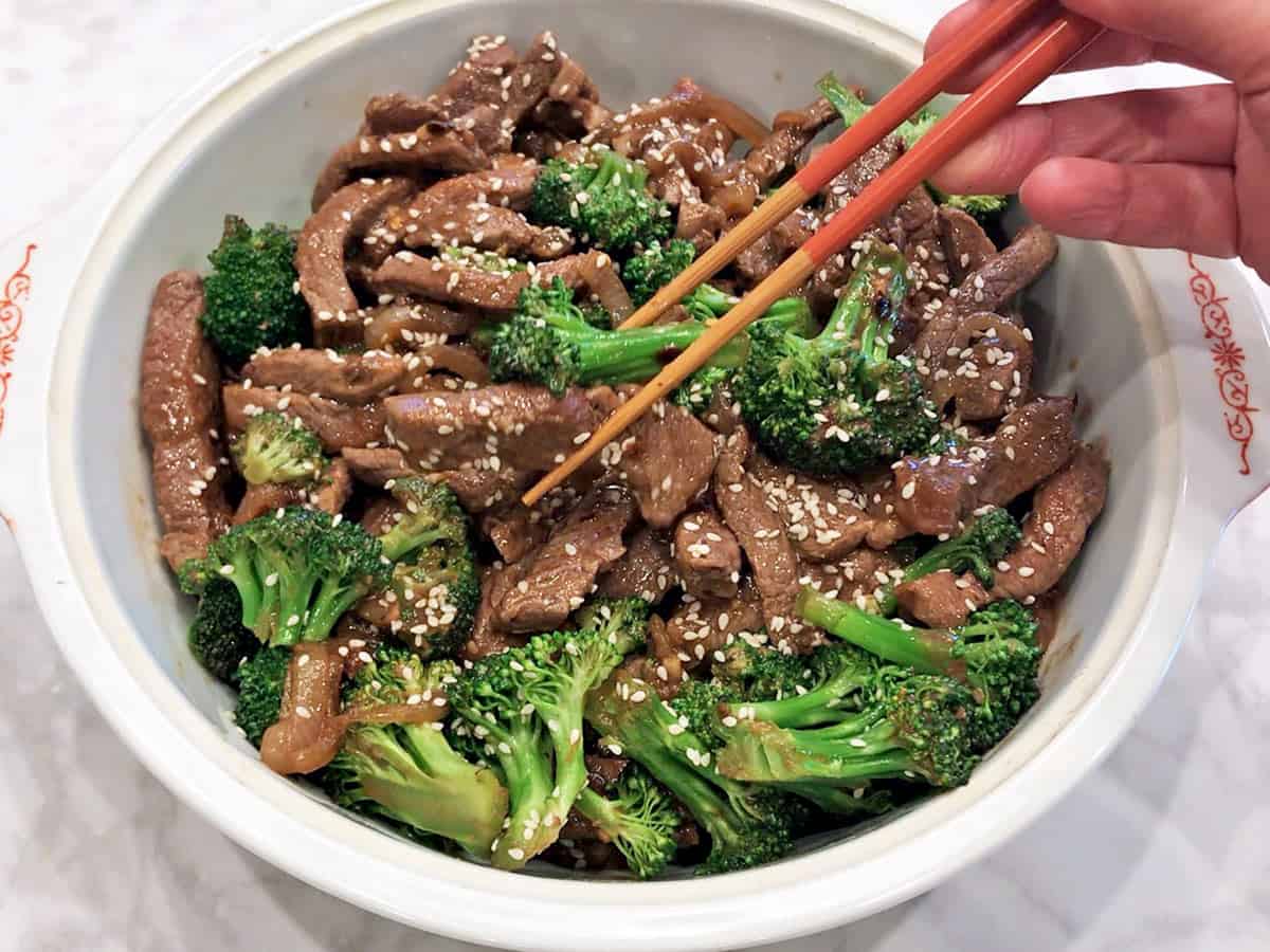 The dish is served with chopsticks.